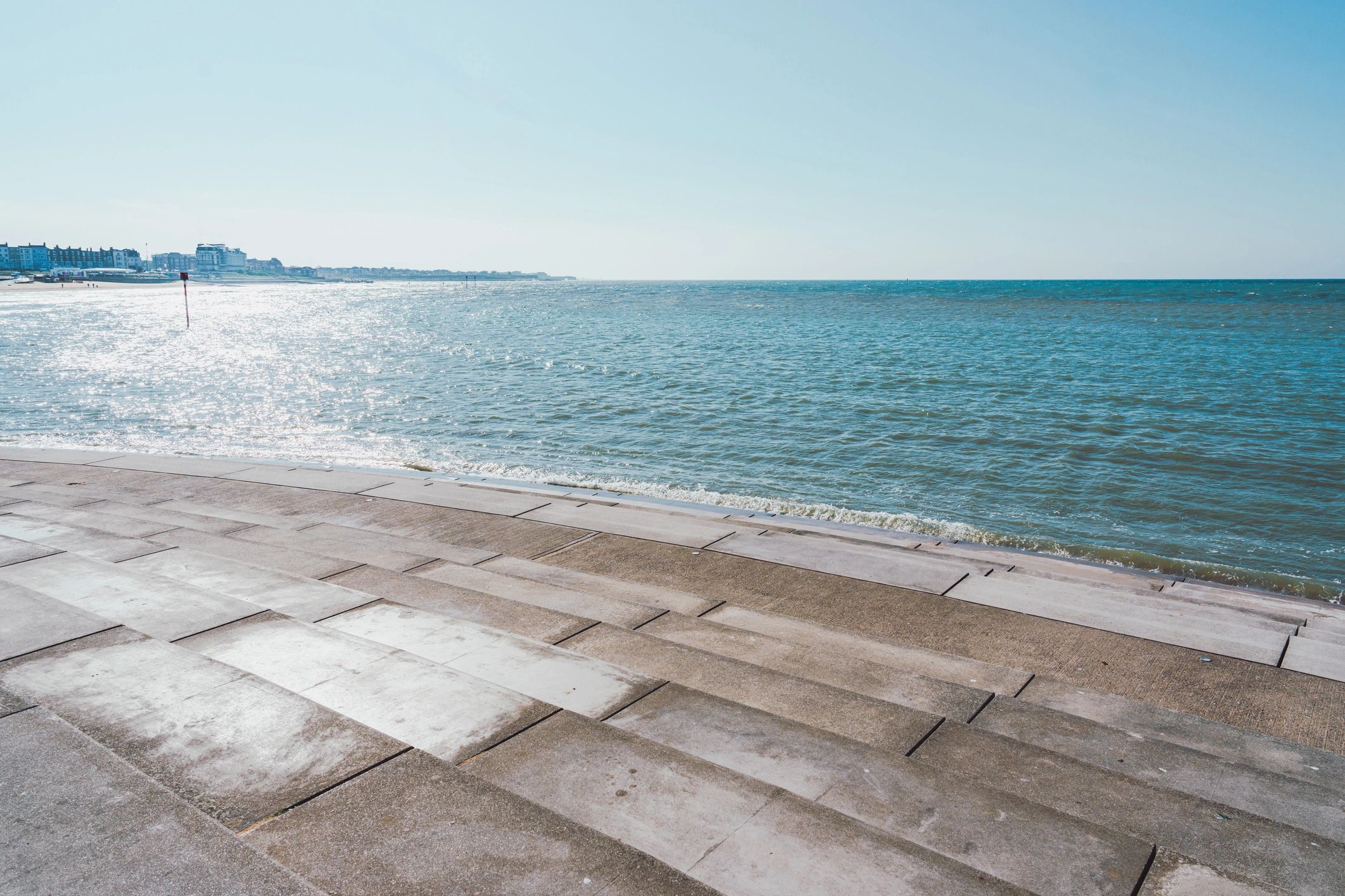 Ocean waves along a quiet shoreline