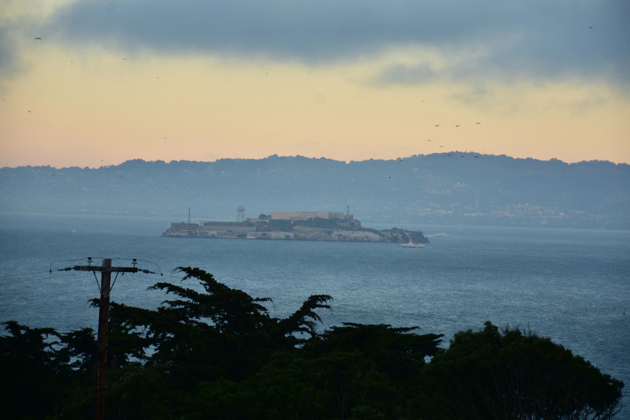 San Francisco Bay coastline in early morning light with calm water